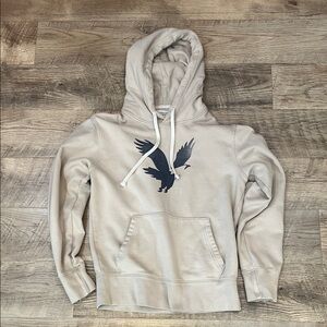 American Eagle Outfitters Cream Hoodie with Eagle Graphic